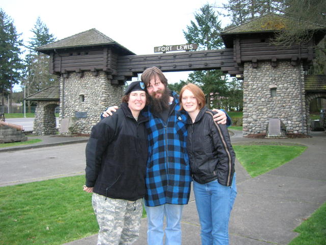 My sister, myself, and Robin standing in front of the Ft. Lewis entrance.  Well the civilian entrance, they kicked us (not my si